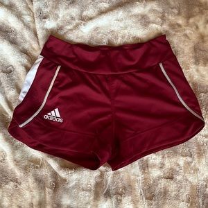 Women’s Red and white Adidas shorts with liner.